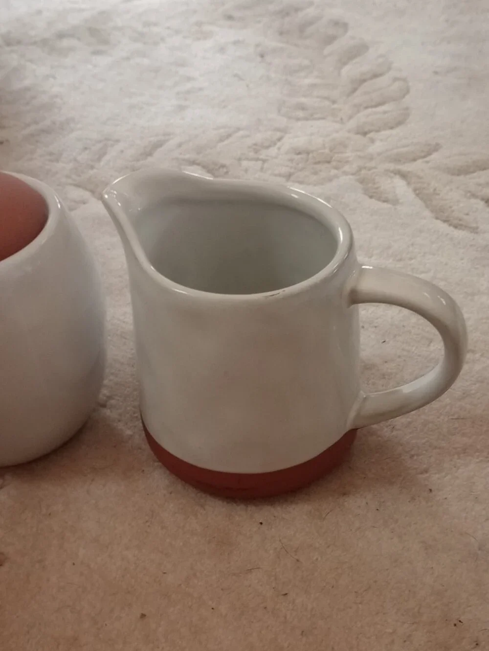 White Ceramic Creamer and Sugar Jar with Terracotta Accents